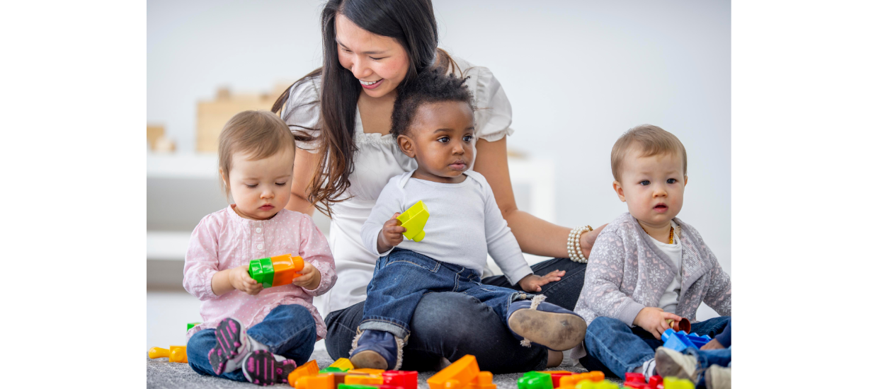 caregiver with three toddlers